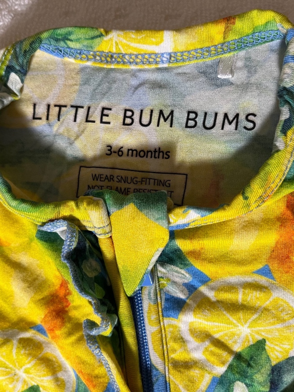 Little Bum Bums zippered sleeper with ruffles on bum and knotted hat